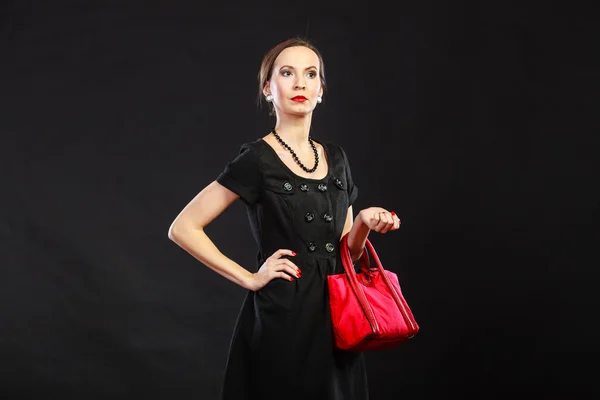 Woman holding red handbag — Stock Photo, Image