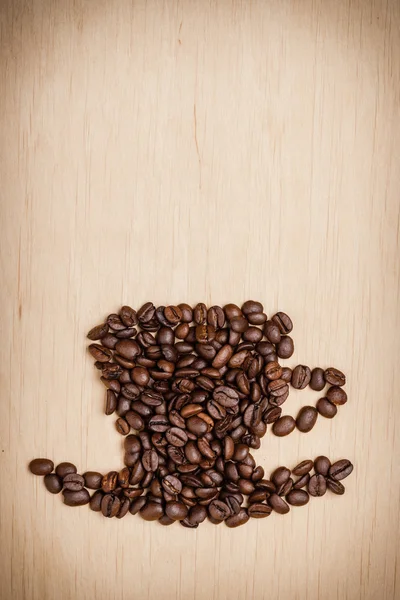 Taza de café hecha de frijoles tostados —  Fotos de Stock