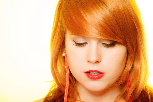 Girl wearing candy earrings — Stock Photo, Image