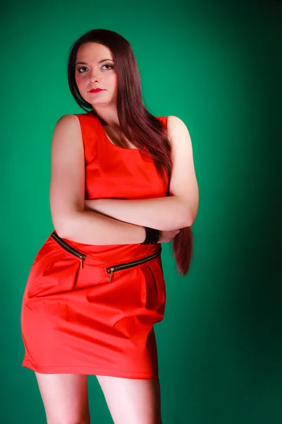 Woman in red dress posing — Stock Photo, Image