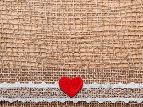 Coeur rouge sur tissu — Photo