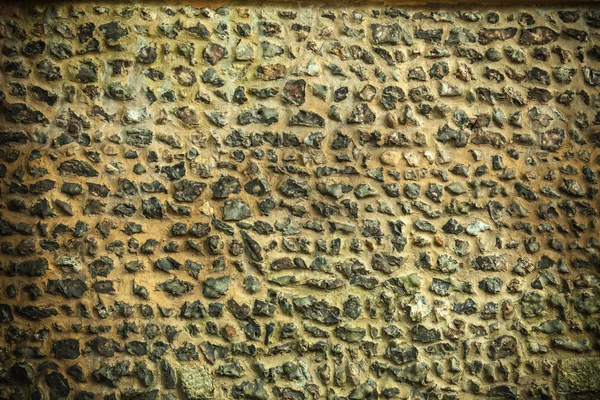 Parede de pedra rachado desigual — Fotografia de Stock