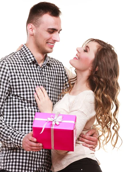 Man surprising woman with a gift — Stock Photo, Image