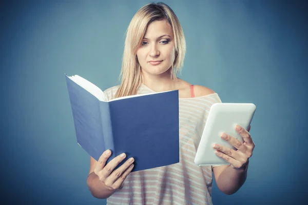 Woman with traditional book and e-book reader tablet — Stock Photo, Image