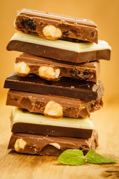 Pila de diferentes chocolates — Foto de Stock