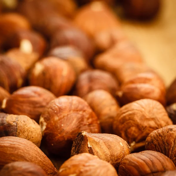 Hazelnuts on rustic old  table — Stock Photo, Image