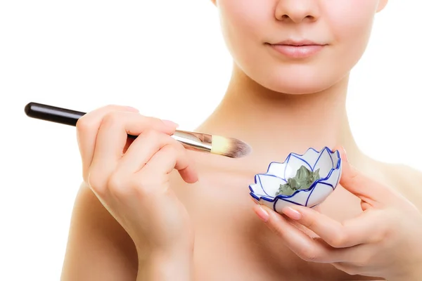 Woman applying clay mud mask — Stock Photo, Image