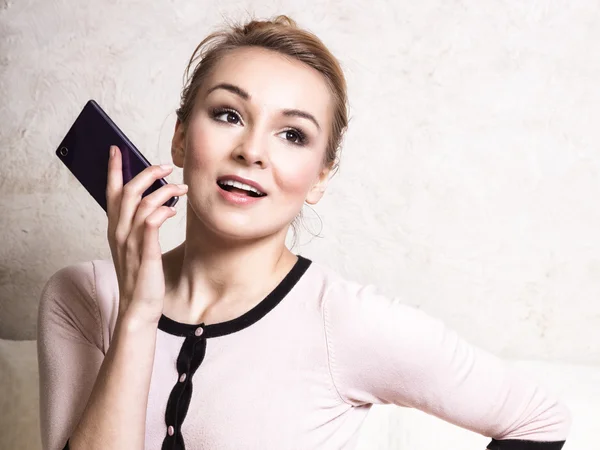 Businesswoman holding mobile phone — Stock Photo, Image