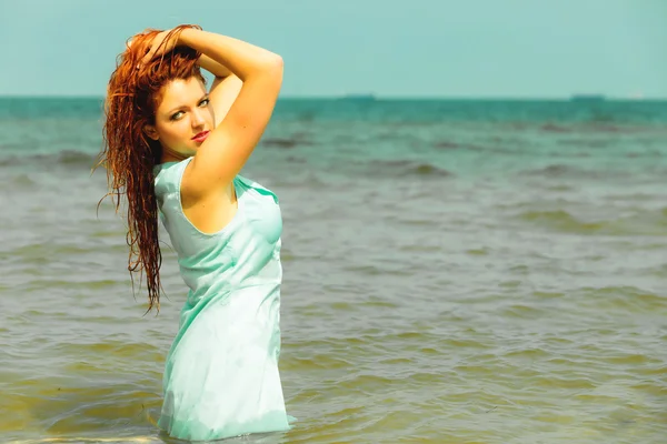 Girl in wet clothes standing — Stock Photo, Image