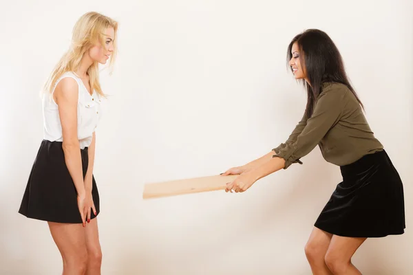 Women having fun blowing wind — Stock Photo, Image