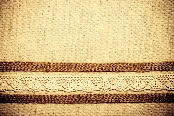 Lace frame on linen cloth background — Stock Photo, Image