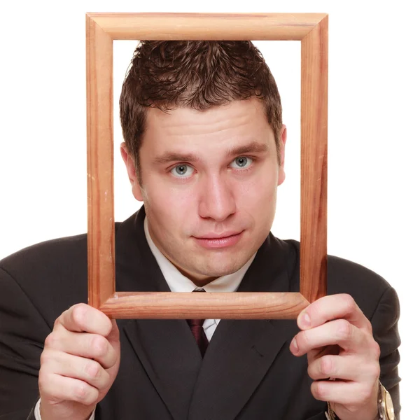 Hombre enmarcando su cara con marco —  Fotos de Stock