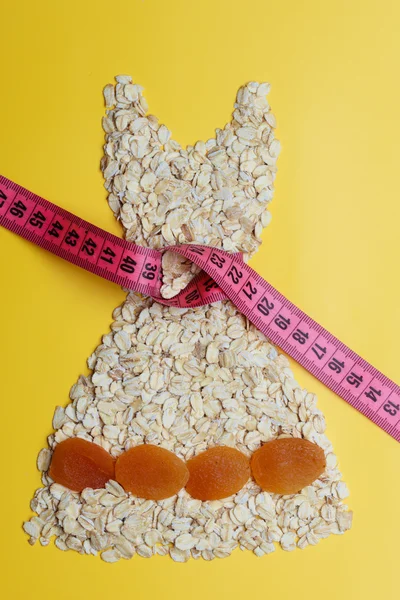 Dress shape made from oatmeal — Stock Photo, Image