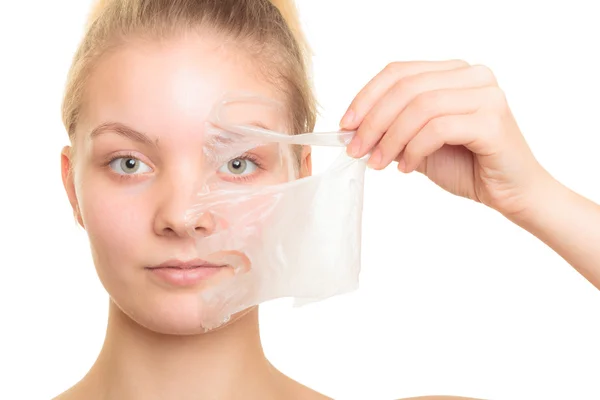 Girl removing mask — Stock Photo, Image