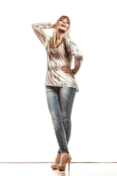 Woman  in denim trousers posing — Stock Photo, Image