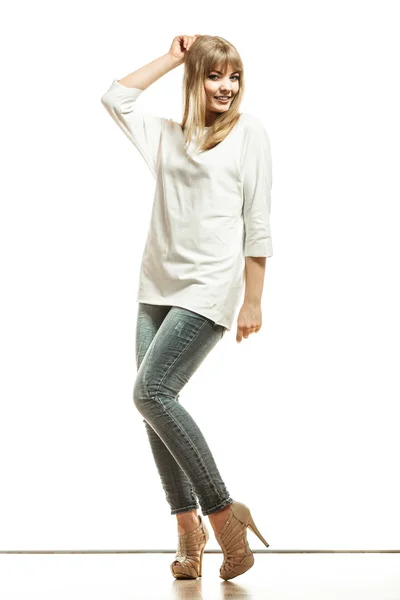 Woman in denim pants posing — Stock Photo, Image