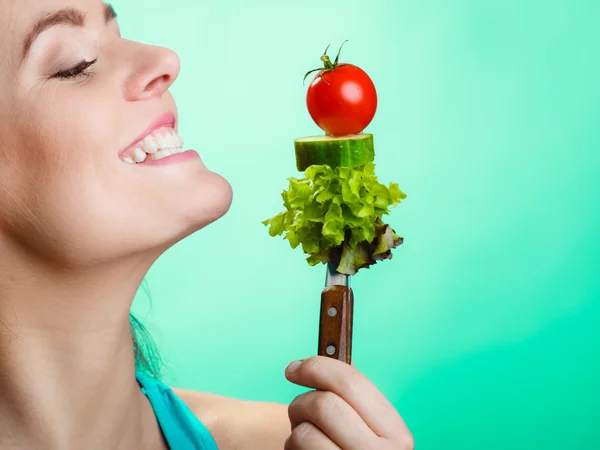 Woman holding fork — Stock Photo, Image