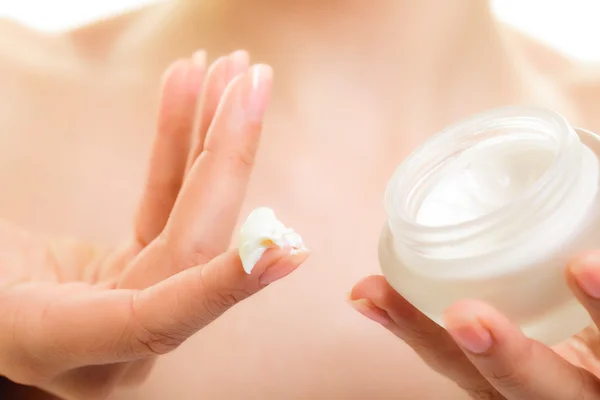 Moisturizing cream in female hands — Stock Photo, Image