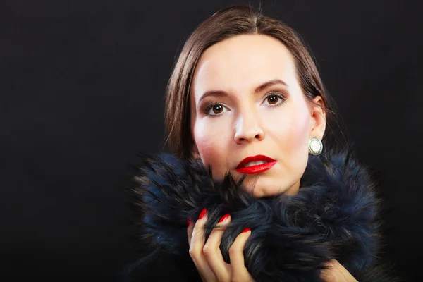 Woman in fur coat posing — Stock Photo, Image