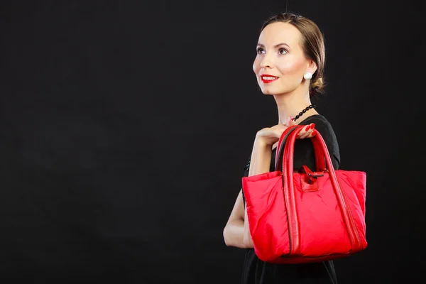 Woman holding handbag — Stock Photo, Image