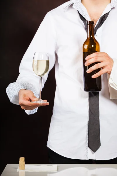 Waiter serving white wine — Stock Photo, Image