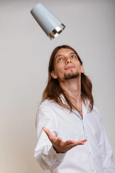 Young man with shaker making cocktail drink — Stock Photo, Image