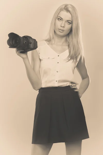 Woman taking photos with camera — Stock Photo, Image