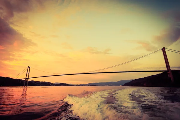 Sunset over suspension bridge in Bergen, Norway — Stock Photo, Image