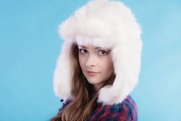 Woman in fur cap posing — Stock Photo, Image