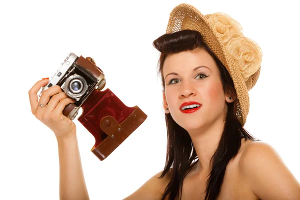 Menina de chapéu segurando câmera vintage — Fotografia de Stock