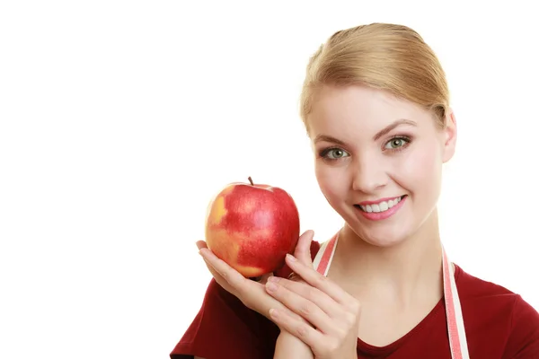 Housewife offering apple Stock Image