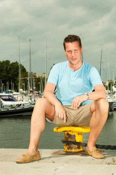 Man posing on pier — Stock Photo, Image