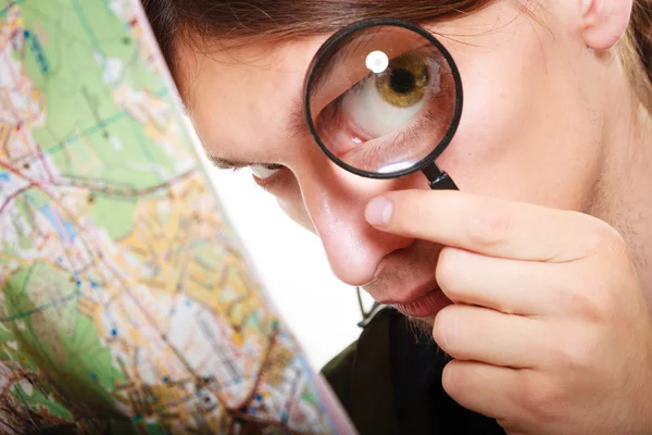 Man looking through  glass — Stock Photo, Image