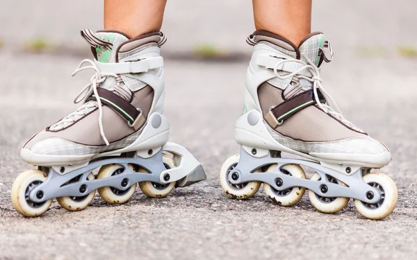 Part of human legs in inline skates — Stock Photo, Image