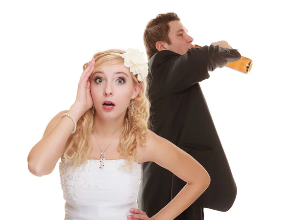 Bride with alcoholic drinking groom — Stock Photo, Image