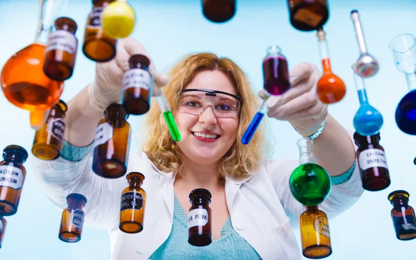 Chemist  holding test tubes — Stock Photo, Image