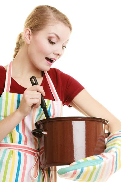 Housewife holding pot of soup — Stock Photo, Image