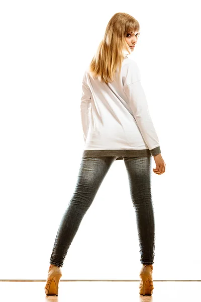 Woman in denim trousers posing — Stock Photo, Image