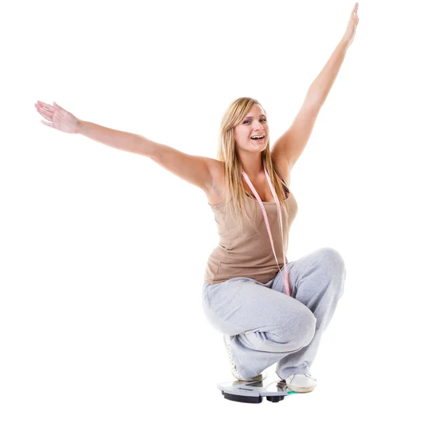 Girl celebrating weightloss — Stock Photo, Image