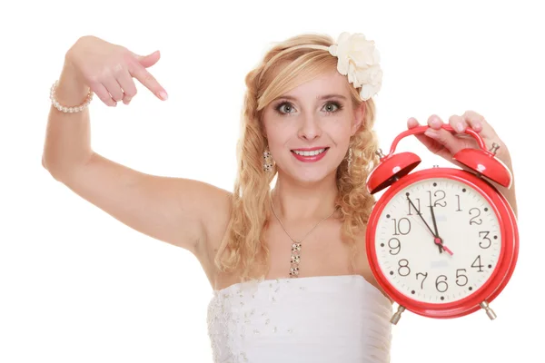 Bride holding alarm clock. — Stock Photo, Image