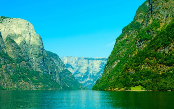 Tourism and travel. Mountains and fjord in Norway. Stock Picture
