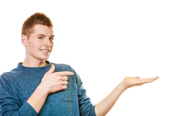 Young man holding open palm — Stock Photo, Image