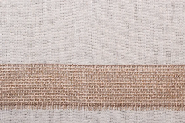 Nastro di iuta su sfondo tela di lino — Foto Stock