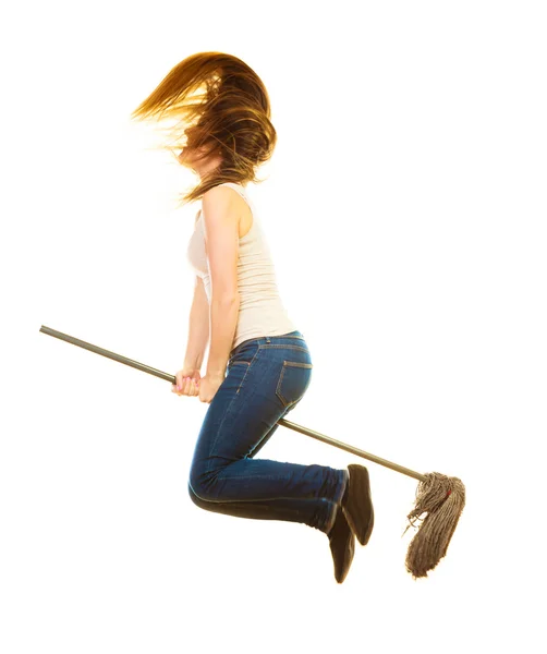 Mujer de limpieza divertida con fregona volando —  Fotos de Stock