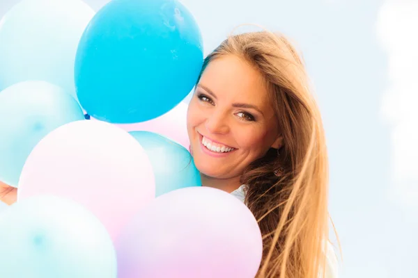 Teen girl with colorful balloons — Stock Photo, Image