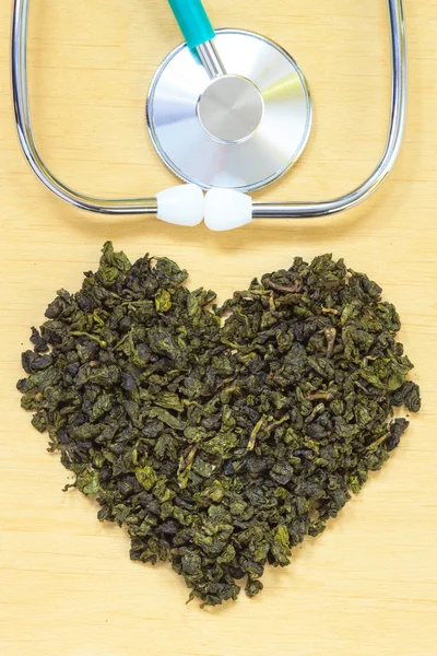 Zielona herbata i stetoskop — Zdjęcie stockowe