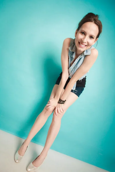 Girl in jeans shirt posing — Stock Photo, Image