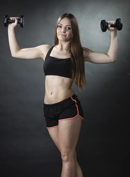 Chica entrenamiento hombros músculos —  Fotos de Stock