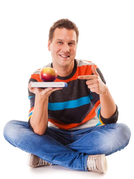 Hombre sosteniendo libro y manzana roja. Mente y cuerpo sanos — Foto de Stock