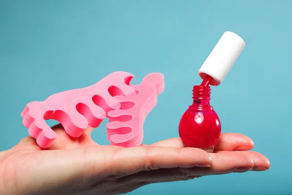 Nail polish and toe separators — Stock Photo, Image